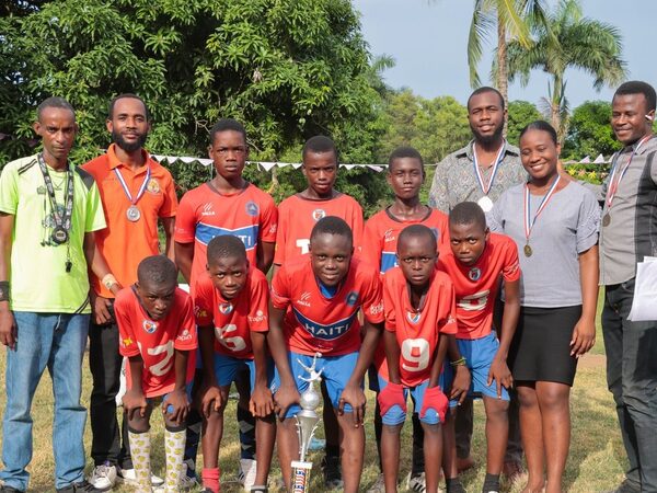 Soccer team champions with trophy