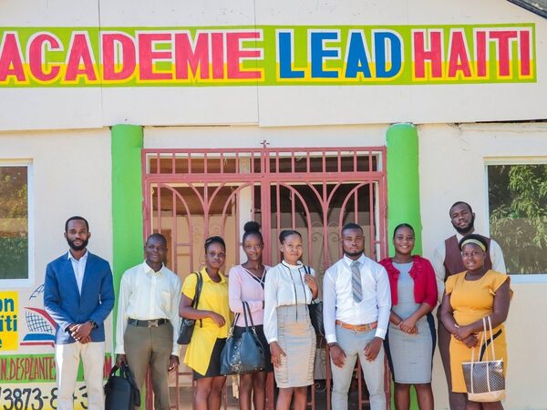 Staff at Académie Lead Haiti building